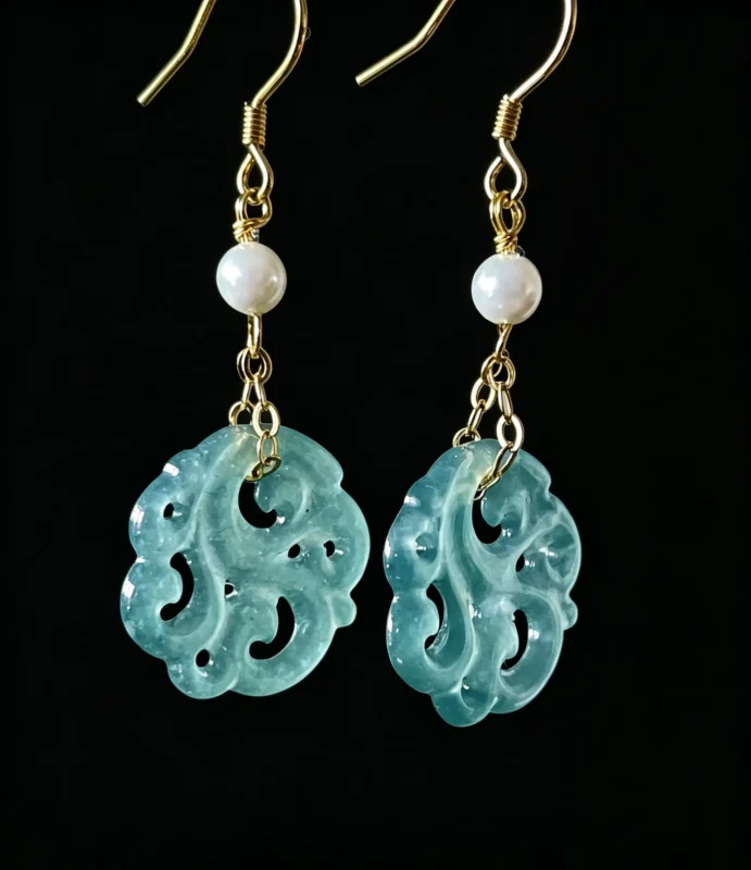 Custom open‑work carved pearl hook dangle earrings, sample crafted in aqua jade, design also available with natural aquamarine, oriental bespoke fine jewelry