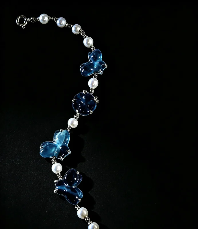 Bespoke custom carved aquamarine butterfly bracelet with natural pearls, re‑creatable with your preferred natural gemstone, QuillGem handcrafted jewellery
