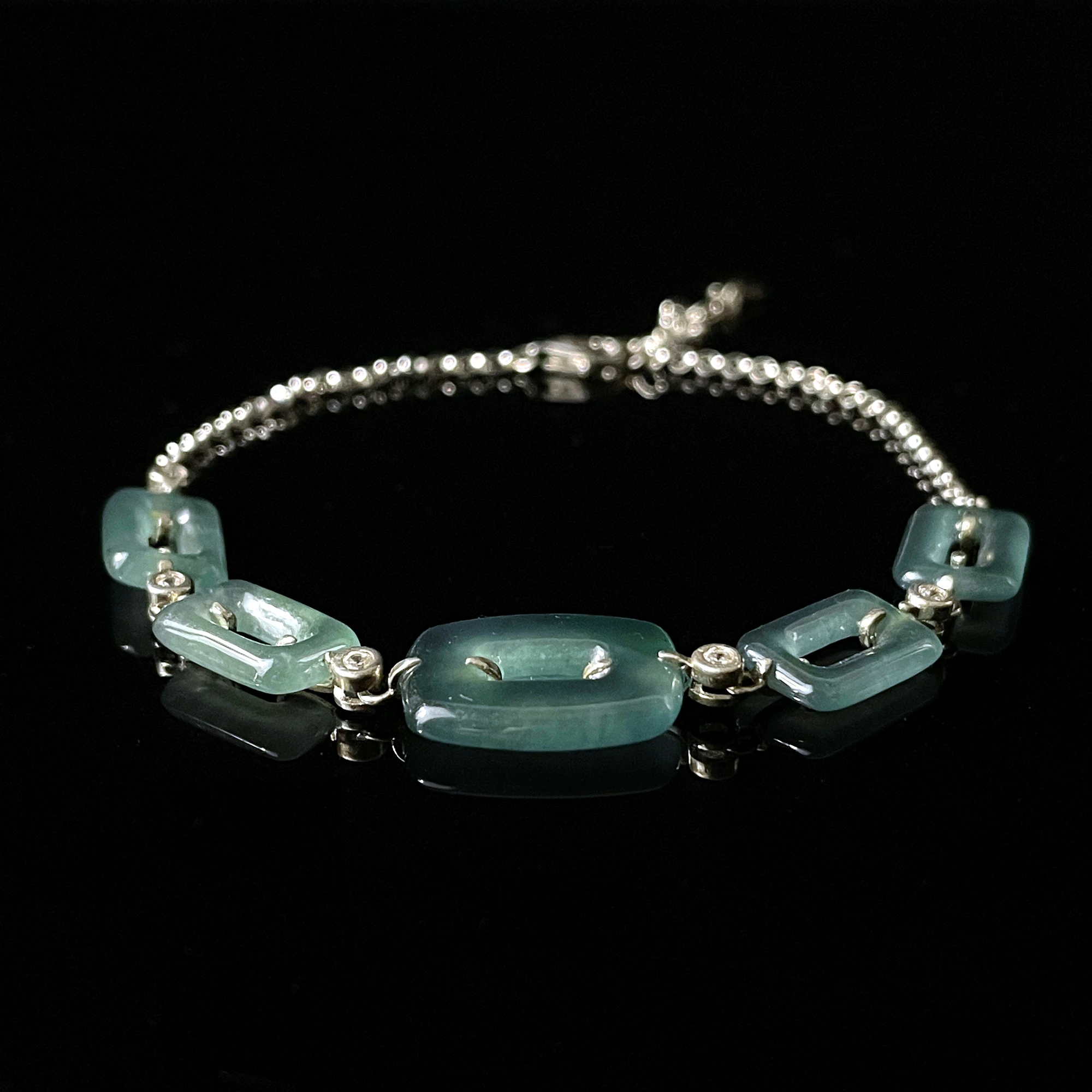 ### Ice‑green jade hollow square link bracelet translucent natural jade dainty gemstone wrist jewelry --- ### Ice‑green jade hollow square link bracelet translucent natural jade dainty gemstone wrist jewelry ---